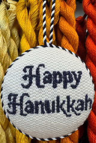 Finished needlepoint Happy Hanukkah ornament